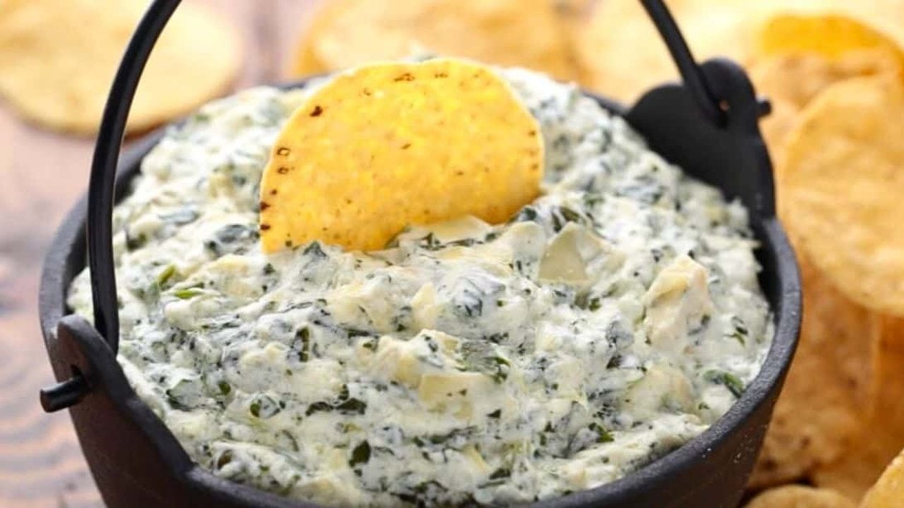 Best Spinach And Artichoke Dip Recipe Creamy spinach and artichoke dip in a pot with tortilla chips, an easy eight ingredient no oven party dip