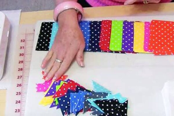 Finished Iron 2″ Blocks Into Triangles To Make This Bowtie Quilt, a completed DIY project