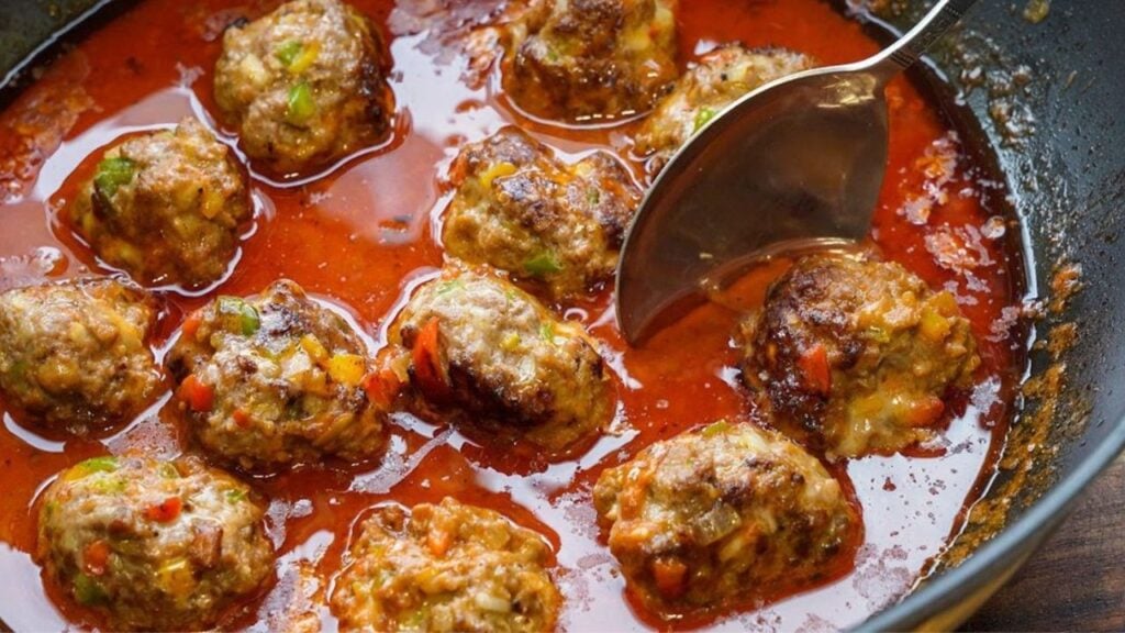 Cheesy Meatballs in Tomato Sauce, homemade and freshly served