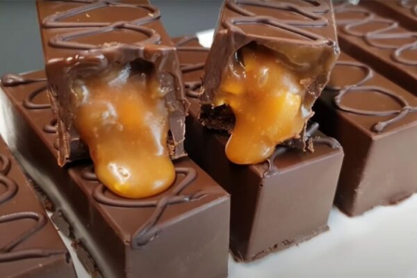 Homemade Chocolate with Caramel and Peanuts, homemade and freshly served
