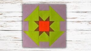 Finished Churn Dash Star Quilt Block, a completed DIY project