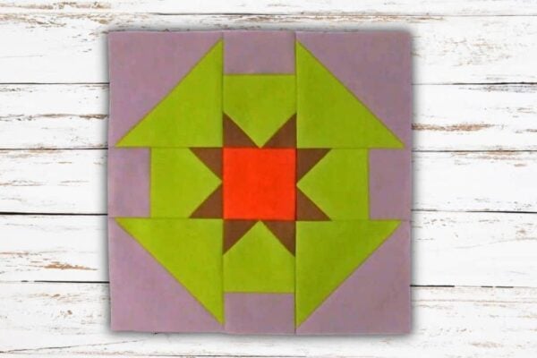 Finished Churn Dash Star Quilt Block, a completed DIY project
