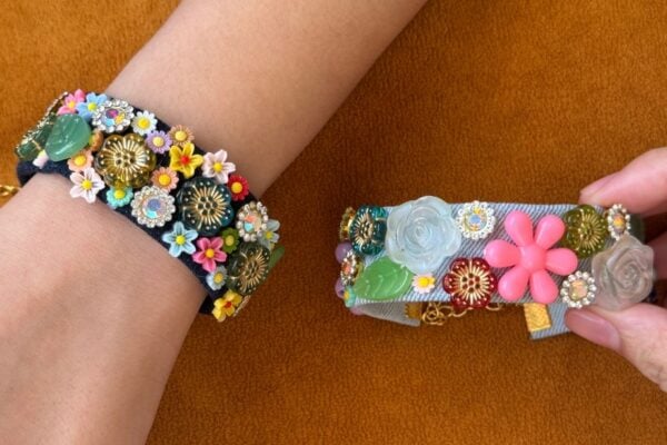 DIY bracelet ideas - finished denim flower bracelet made from old jeans with beads and buttons