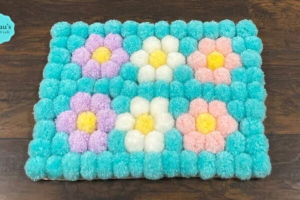 Finished DIY Flower Pom Pom Rug, a completed DIY project