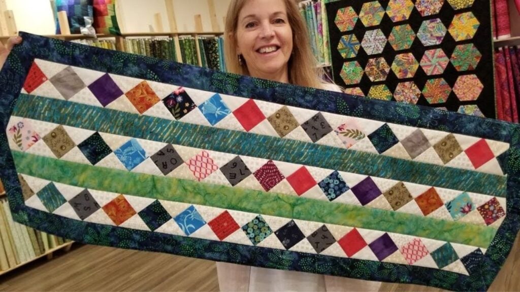 Finished Donna’s Scrap Buster Table Runner, a completed DIY project