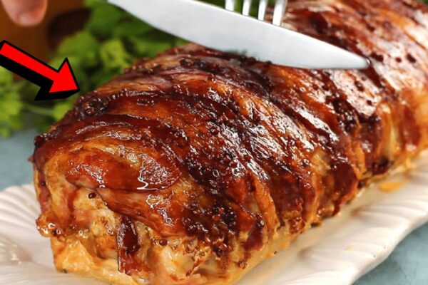 Juicy Bacon-Wrapped Pork Loin, homemade and freshly served