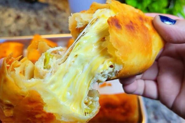 Easy-to-Make Crockpot Cheesy Chicken Chimichangas, homemade and freshly served
