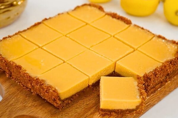 Easy Creamy Lemon Bars, homemade and freshly served