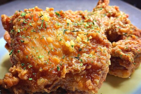 Easy Crispy Fried Honey Garlic Chicken Thighs, homemade and freshly served