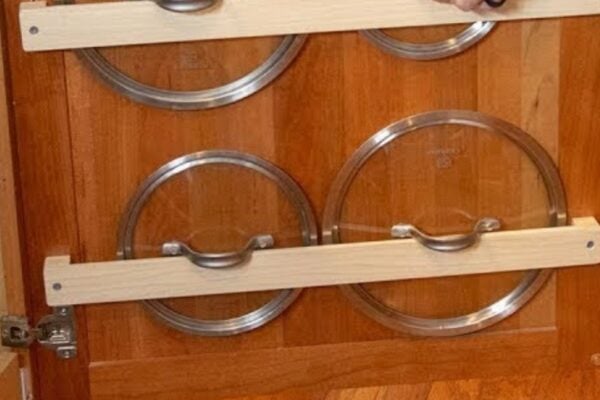 Finished Easy DIY Cabinet Lid Organizer, a completed DIY project