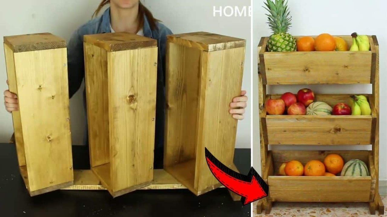 DIY market style wooden fruit holder, a three tier stained wood stand with angled shelves full of oranges, apples and melons