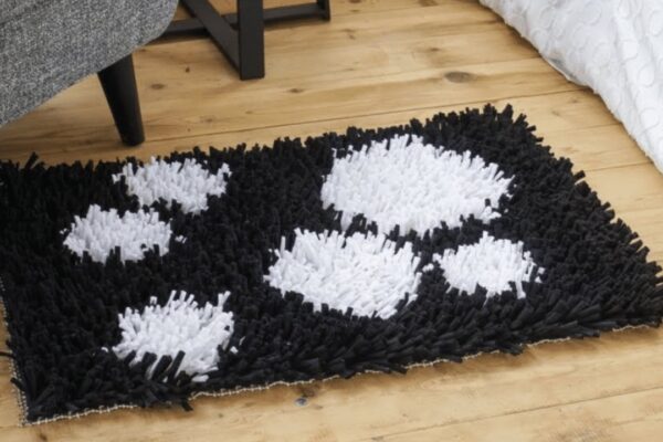 Finished How to Repurpose an Old T-Shirt Into a Rug, a completed DIY project