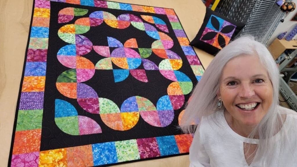 Finished Donna Jordan’s Drunkard’s Path Flower Patch Quilt, a completed DIY project