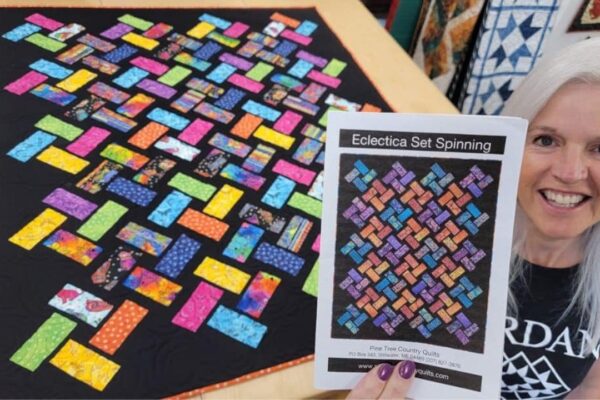 Finished Easy “Eclectica Set Spinning” Quilt, a completed DIY project