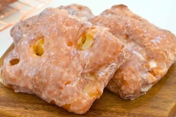 Super Crunchy Glazed Apple Fritters, homemade and freshly served