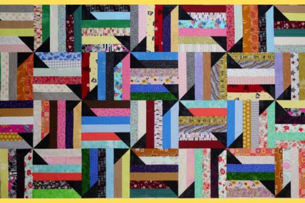 a Jelly Roll Sizzle Quilt (with Free Pattern), homemade and freshly served