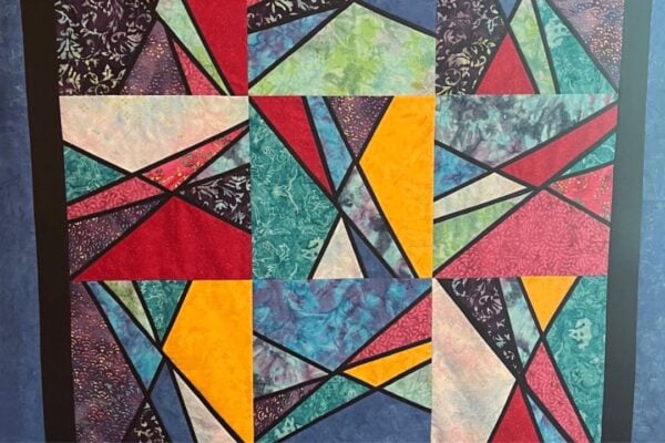 Finished Easy Kaleidoscope Stained Glass Quilt, a completed DIY project