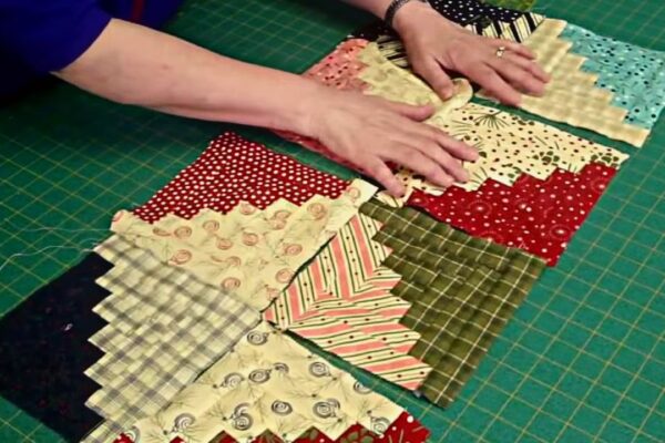 Finished Easy Log Cabin Quilt Block Using Honey Bun Strips, a completed DIY project