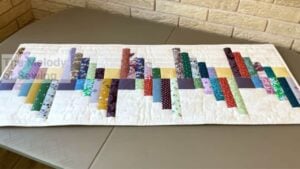 Finished Easy Log Cabin Quilt Using Fabric Scraps, a completed DIY project