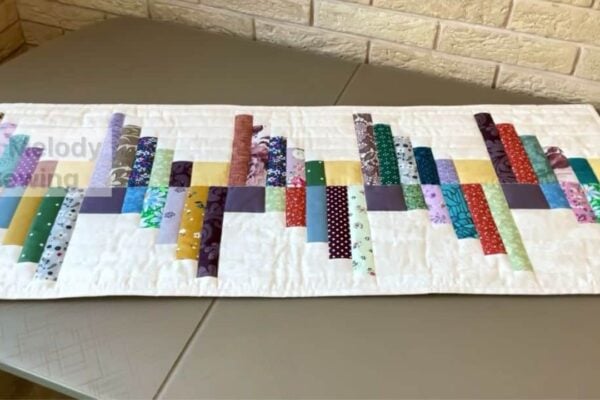 Finished Easy Log Cabin Quilt Using Fabric Scraps, a completed DIY project