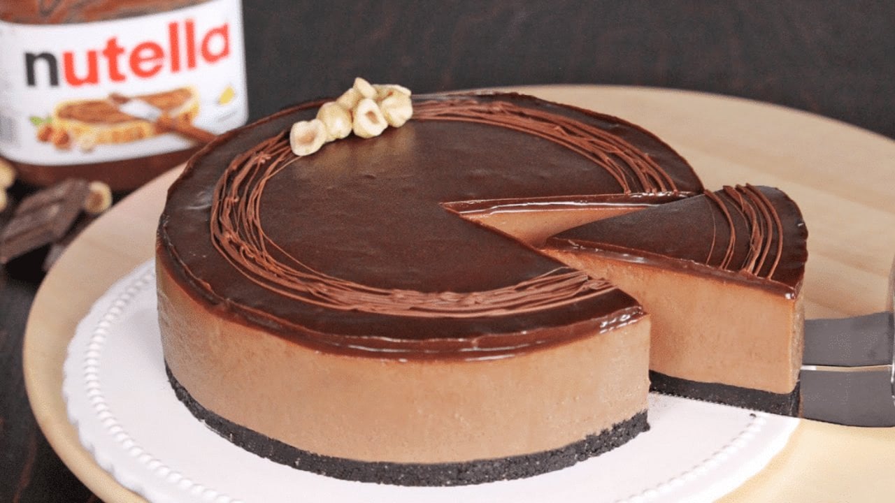 Easy No Bake Nutella Cheesecake Recipe Easy no bake Nutella cheesecake with an Oreo hazelnut crust and a glossy Nutella chocolate glaze, an easy no bake dessert