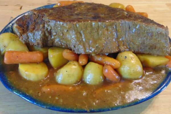 Old-Fashioned Sunday Pot Roast Dinner, homemade and freshly served