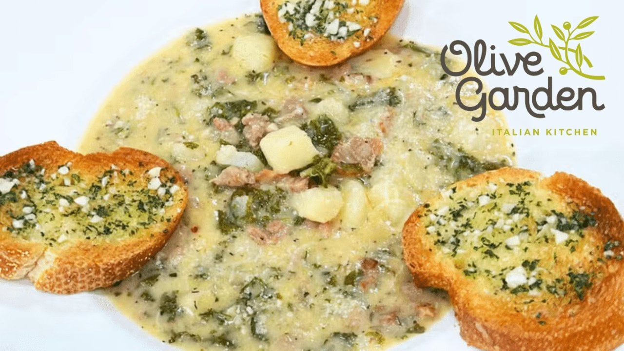 Copycat Olive Garden Zuppa Toscana With Kale Zuppa toscana with kale, sausage and potato under herb butter toasts, Olive Garden Italian Kitchen logo in the corner