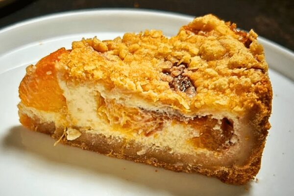 Easy Peach Cobbler Cheesecake, homemade and freshly served