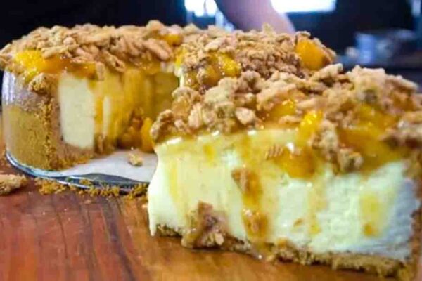 Easy Peach Cobbler Cheesecake, homemade and freshly served