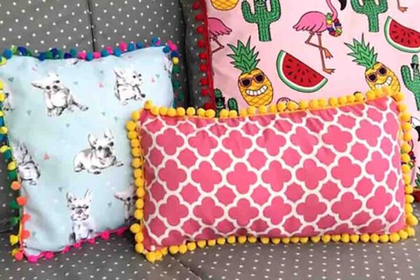 Finished Easy Pom Pom Cushion Cover, a completed DIY project