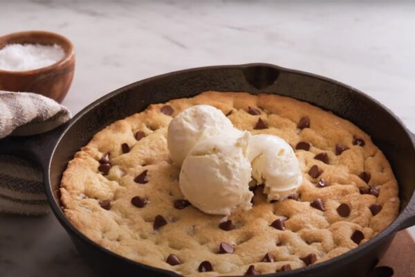 an Easy Skillet Chocolate Chip Cookie, homemade and freshly served
