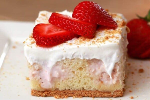 Easy Strawberry Cheesecake Poke Cake, homemade and freshly served
