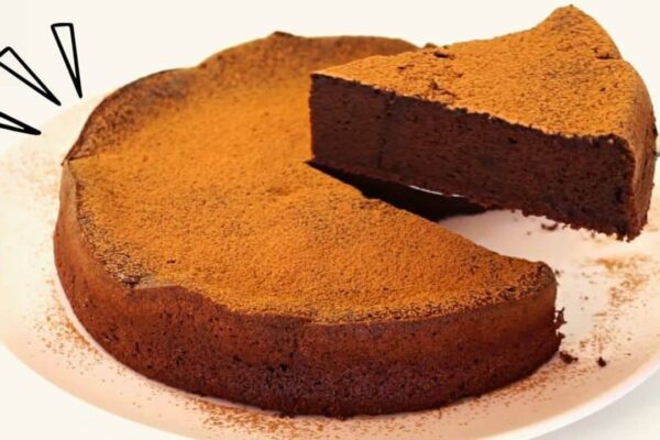 A 2-Ingredient Chocolate Cake, homemade and freshly served