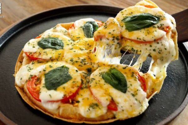 Fluffy Egg Tomato Pizza, homemade and freshly served