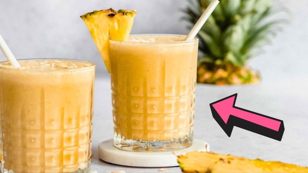 Frozen Pineapple Smoothie With Coconut Frozen pineapple smoothie blended thick with coconut milk ice cubes and garnished with pineapple slices