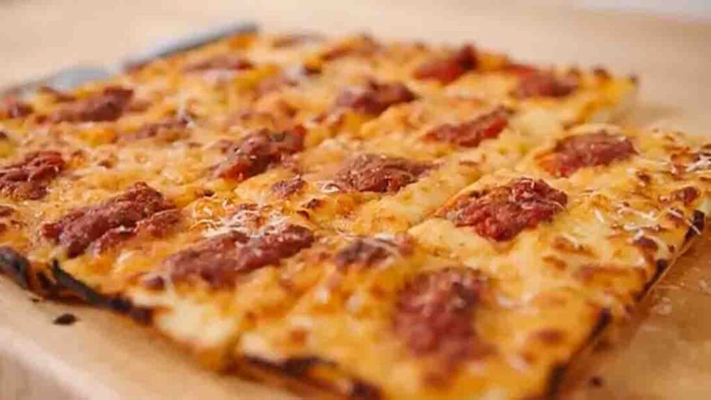 Thin and Crispy Grandma Pizza, homemade and freshly served