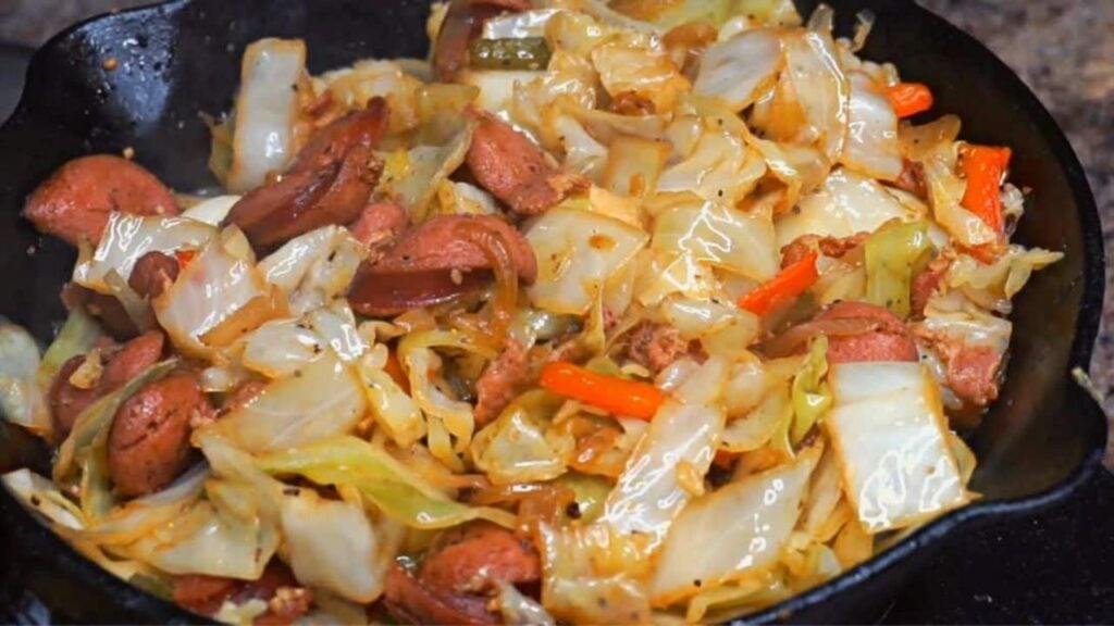Simple Skillet Fried Cabbage With Bacon, Sausage, & Bell Peppers, homemade and freshly served