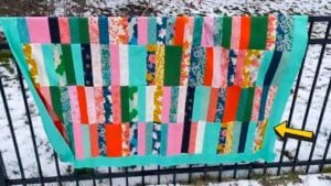 A Jelly Roll Quilt, homemade and freshly served