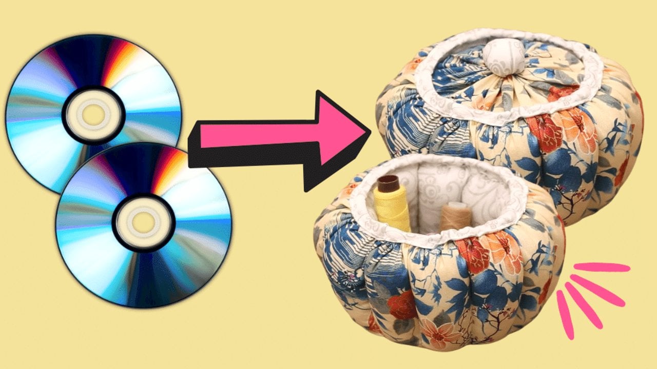 DIY jewelry box made using old CDs, a padded fabric organizer with a round lid, an upcycled craft project