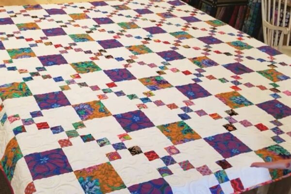 Finished Kaffe Iris Chain Links Quilt Pattern, a completed DIY project