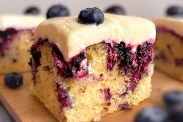 Lemon Blueberry Poke Cake, homemade and freshly served