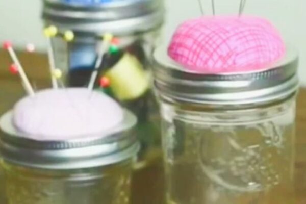Finished Hands Down, The Best Mason Jar Craft For Everyone Who Loves To Sew, a completed DIY project