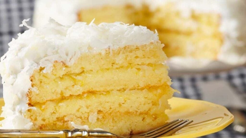 Moist and Fluffy Coconut Cake With Lemon Curd, homemade and freshly served