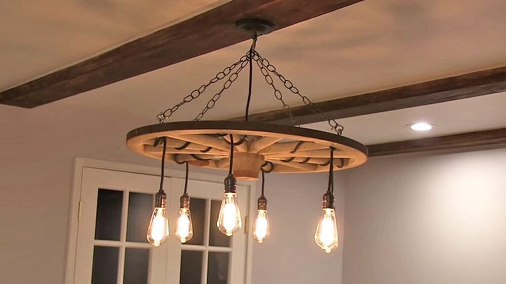 Finished Upcycle A Wagon Wheel Into The Coolest Chandelier, a completed DIY project
