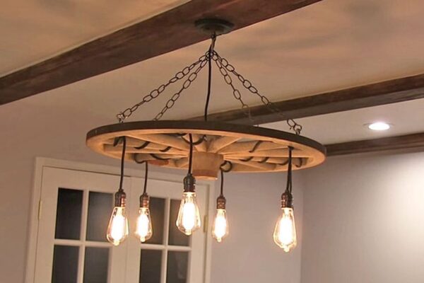 Finished Upcycle A Wagon Wheel Into The Coolest Chandelier, a completed DIY project