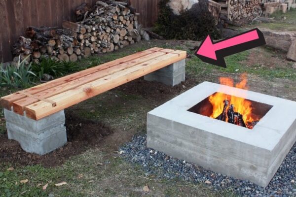 an Outdoor Concrete and Wood Bench