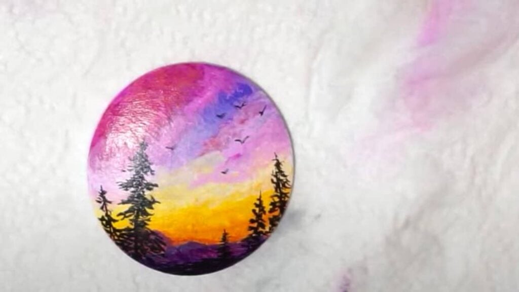 Finished How to Paint a Sunset on a Small Wooden Button, a completed DIY project