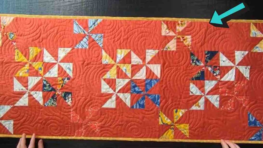 Finished Painterly Pinwheels Table Runner Quilt, a completed DIY project