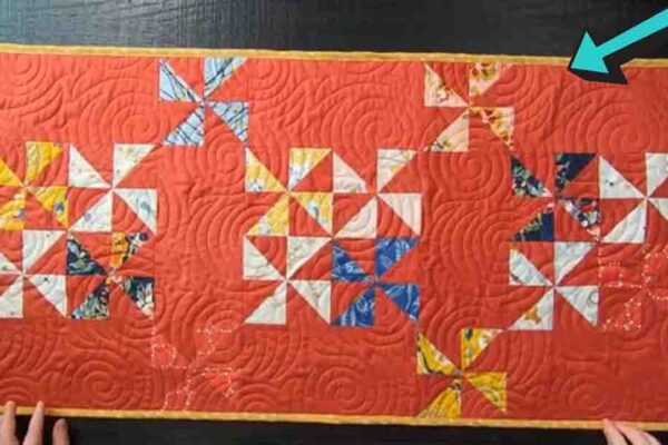 Finished Painterly Pinwheels Table Runner Quilt, a completed DIY project