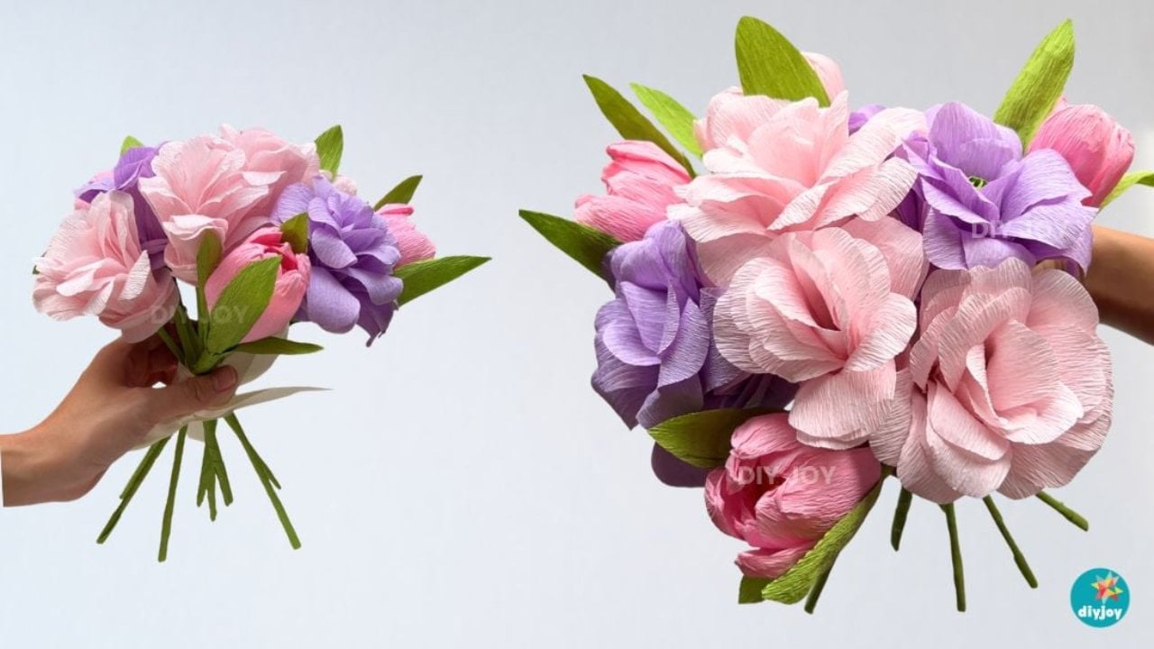 Paper Roses for Beginners From Crepe Paper Crepe paper roses in pink and lilac held as a small bouquet, with a larger finished bouquet of paper flowers beside